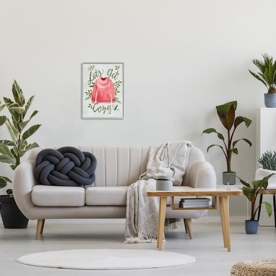 Stupell Industries Let's Get Cozy Holly Plants Pink Winter Sweater in Frame Wall Art